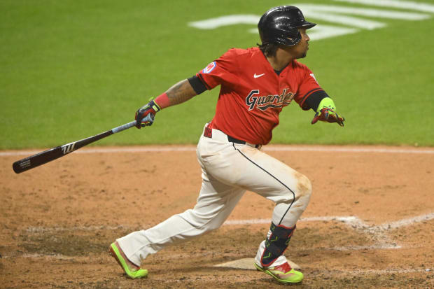 Jose Ramirez swings and hits a single