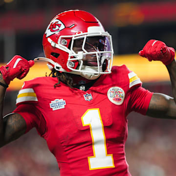 Sep 5, 2024; Kansas City, Missouri, USA; Kansas City Chiefs wide receiver Xavier Worthy (1) celebrates with wide receiver JuJu Smith-Schuster (9) after scoring a touchdown during the second half against the Baltimore Ravens at GEHA Field at Arrowhead Stadium. Mandatory Credit: Jay Biggerstaff-Imagn Images