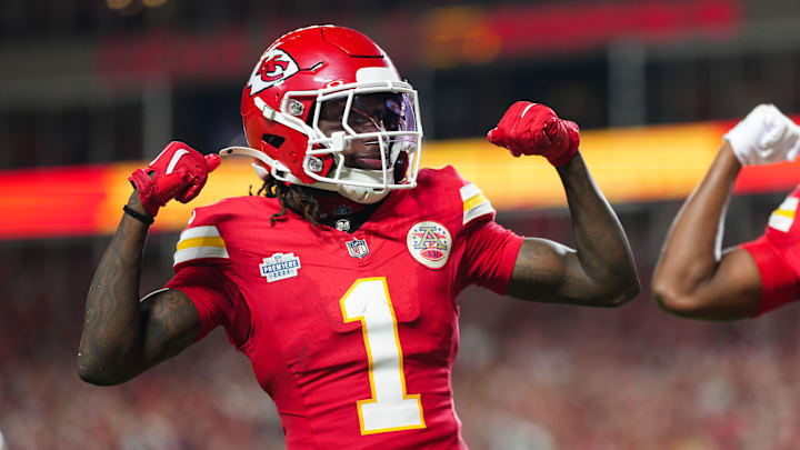 Sep 5, 2024; Kansas City, Missouri, USA; Kansas City Chiefs wide receiver Xavier Worthy (1) celebrates with wide receiver JuJu Smith-Schuster (9) after scoring a touchdown during the second half against the Baltimore Ravens at GEHA Field at Arrowhead Stadium. Mandatory Credit: Jay Biggerstaff-Imagn Images