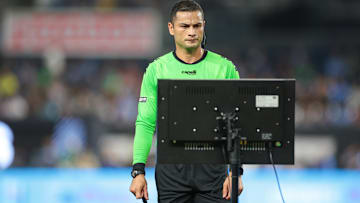 Jul 28, 2024; Bronx, New York, USA; Referee Keylor Herrera looks at a VAR screen during the first half between New York City FC and Queretaro FC at Yankee Stadium. Mandatory Credit: Vincent Carchietta-Imagn Images