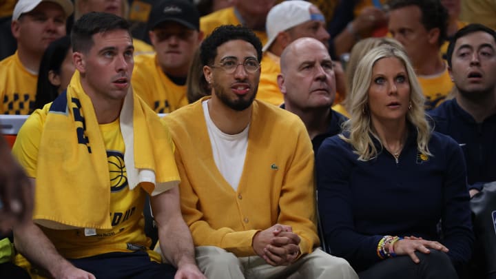 May 25, 2024; Indianapolis, Indiana, USA; Indiana Pacers guard Tyrese Haliburton (middle) looks on from the bench during the first quarter of game three of the eastern conference finals against the Boston Celtics  in the 2024 NBA playoffs at Gainbridge Fieldhouse. Mandatory Credit: Trevor Ruszkowski-USA TODAY Sports