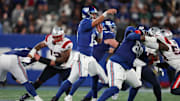 New York Giants quarterback Tommy DeVito (15) throws a pass during the second half against the New England Patriots