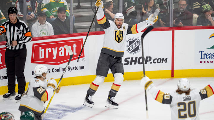 Apr 24, 2025; Saint Paul, Minnesota, USA; Vegas Golden Knights defenseman Alex Pietrangelo (7) celebrates with teammates left wing Brandon Saad (20) and center Brett Howden (21) after scoring against the Minnesota Wild in the first period in game three of the first round of the 2025 Stanley Cup Playoffs at Xcel Energy Center. Mandatory Credit: Matt Blewett-Imagn Images