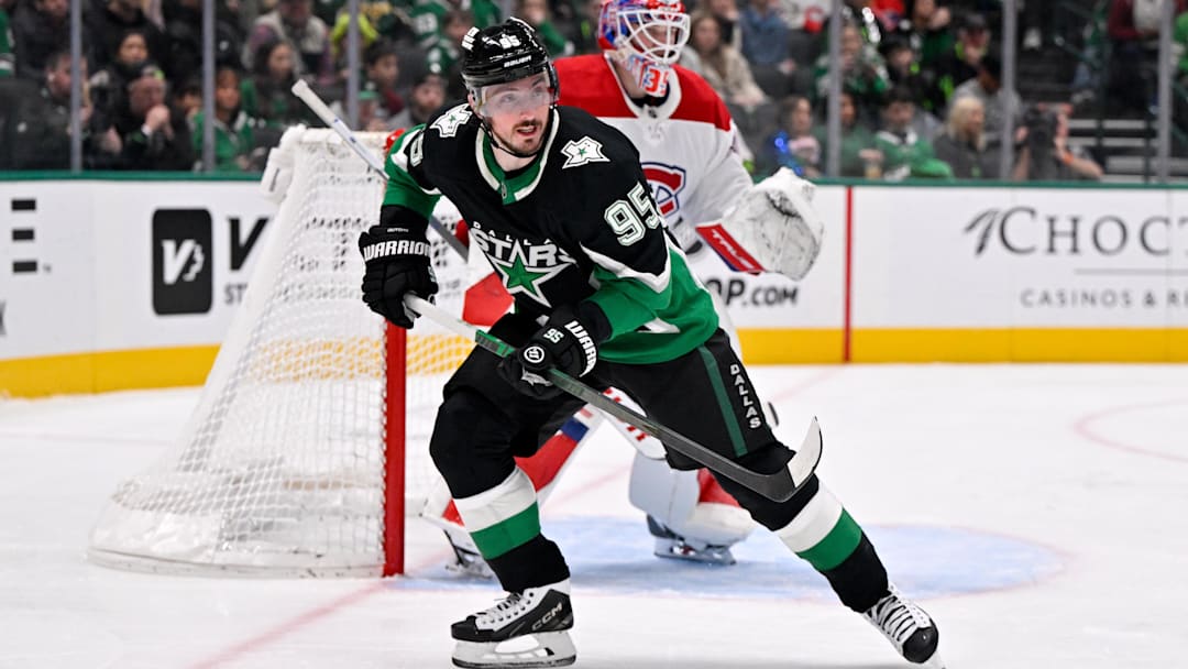 Jan 4, 2026; Dallas, Texas, USA; Montreal Canadiens goaltender Sam Montembeault (35) and Dallas Stars center Matt Duchene (95) look for the puck during the game between the Stars and the Canadiens at the American Airlines Center. Mandatory Credit: Jerome Miron-Imagn Images