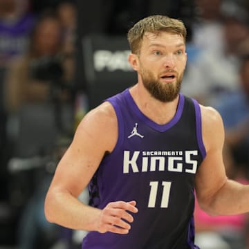 Apr 11, 2025; Sacramento, California, USA; Sacramento Kings forward Domantas Sabonis (11) dribbles against the Los Angeles Clippers during the second quarter at Golden 1 Center. Mandatory Credit: Darren Yamashita-Imagn Images