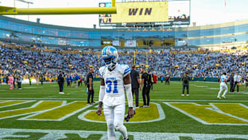 Detroit Lions safety Kerby Joseph walks off the field after the 27-13 loss to the Green Bay Packers at Lambeau Field.
