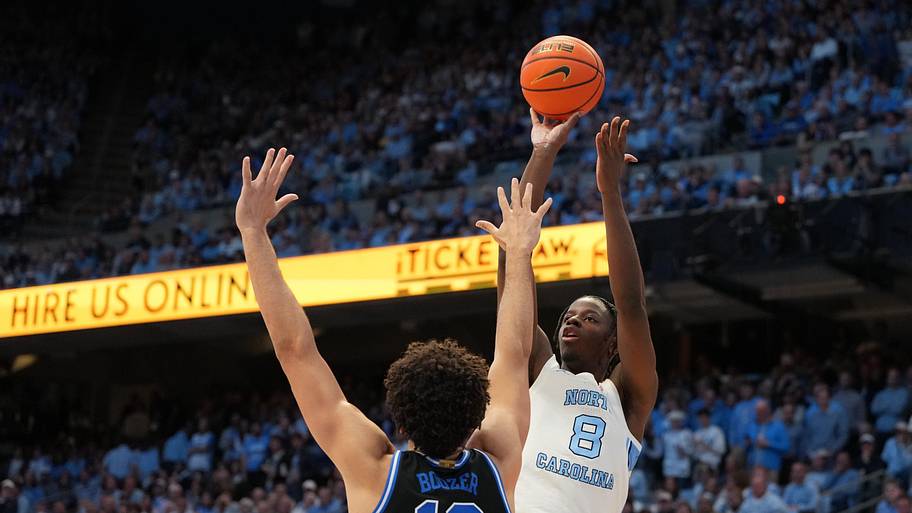 North Carolina forward Caleb Wilson shoots over Duke forward Cameron Boozer during their game last season. 