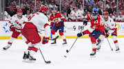 Jan 2, 2025; Sunrise, Florida, USA; Florida Panthers center Carter Verhaeghe (23) shoots the puck against the Carolina Hurricanes during the third period at Amerant Bank Arena. Mandatory Credit: Rich Storry-Imagn Images
