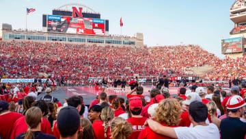 Aug 30, 2023; Lincoln, NE, USA; Fans watch as the Nebraska Cornhuskers and the Omaha Mavericks warm up before their match at Memorial Stadium. 