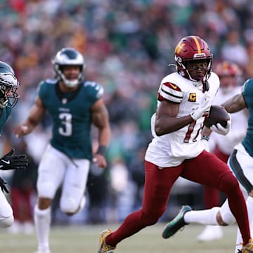 Jan 26, 2025; Philadelphia, PA, USA; Washington Commanders wide receiver Terry McLaurin (17) runs with the ball for a touchdown against the Philadelphia Eagles during the first half in the NFC Championship game at Lincoln Financial Field. Mandatory Credit: Bill Streicher-Imagn Images