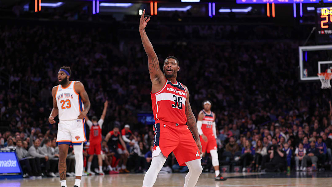 Mar 22, 2025; New York, New York, USA; Washington Wizards guard Marcus Smart (36) reacts after making a three point basket during the second half against the New York Knicks at Madison Square Garden. Mandatory Credit: Vincent Carchietta-Imagn Images