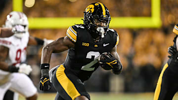 Nov 2, 2024; Iowa City, Iowa, USA; Iowa Hawkeyes running back Kaleb Johnson (2) runs the ball against the Wisconsin Badgers during the second quarter at Kinnick Stadium. Mandatory Credit: Jeffrey Becker-Imagn Images