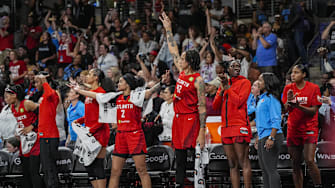 Sep 18, 2025; College Park, Georgia, USA; Atlanta Dream players react on the bench during the game against the Indiana Fever during the first half during game three of round one for the 2025 WNBA Playoffs at Gateway Center Arena at College Park. Mandatory Credit: Dale Zanine-Imagn Images