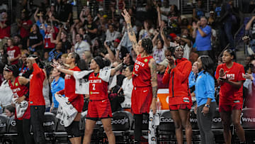 Sep 18, 2025; College Park, Georgia, USA; Atlanta Dream players react on the bench during the game against the Indiana Fever during the first half during game three of round one for the 2025 WNBA Playoffs at Gateway Center Arena at College Park. Mandatory Credit: Dale Zanine-Imagn Images