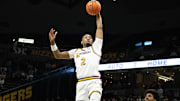 Dec. 3, 2024; Columbia, Mo. USA; Missouri Tigers guard Tamar Bates (2) leaps up for a dunk during a game against the California Golden Bears at Mizzou Arena.