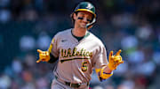 Aug 24, 2025; Seattle, Washington, USA; Athletics shortstop Jacob Wilson (5) rounds the bases after hitting a solo home run during the second inning against the Seattle Mariners at T-Mobile Park. Mandatory Credit: Stephen Brashear-Imagn Images