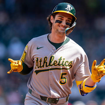 Aug 24, 2025; Seattle, Washington, USA; Athletics shortstop Jacob Wilson (5) rounds the bases after hitting a solo home run during the second inning against the Seattle Mariners at T-Mobile Park. Mandatory Credit: Stephen Brashear-Imagn Images