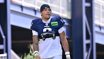 Jul 28, 2025; Foxborough, MA, USA; New England Patriots cornerback Christian Gonzalez (0) heads to the practice fields for training camp at Gillette Stadium. Mandatory Credit: Eric Canha-Imagn Images