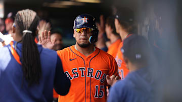 Jul 3, 2025; Denver, Colorado, USA; Houston Astros third baseman Isaac Paredes (15) celebrates scoring in the seventh inning against the Colorado Rockies at Coors Field. Mandatory Credit: Ron Chenoy-Imagn Images
