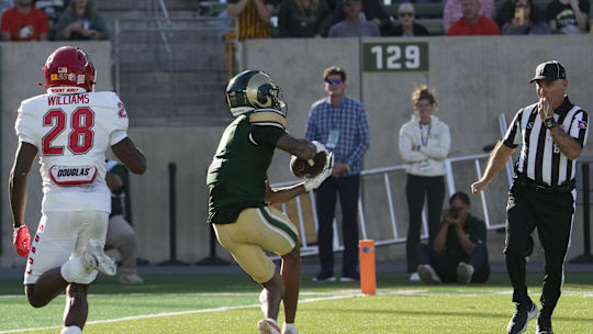 Oct 26, 2024; Fort Collins, Colorado, USA;  Colorado State Rams wide receiver Caleb Goodie (2) hauls in a pass for a touchdown against New Mexico Lobos at Sonny Lubick Field at Canvas Stadium. Mandatory Credit: Michael Madrid-Imagn Images
