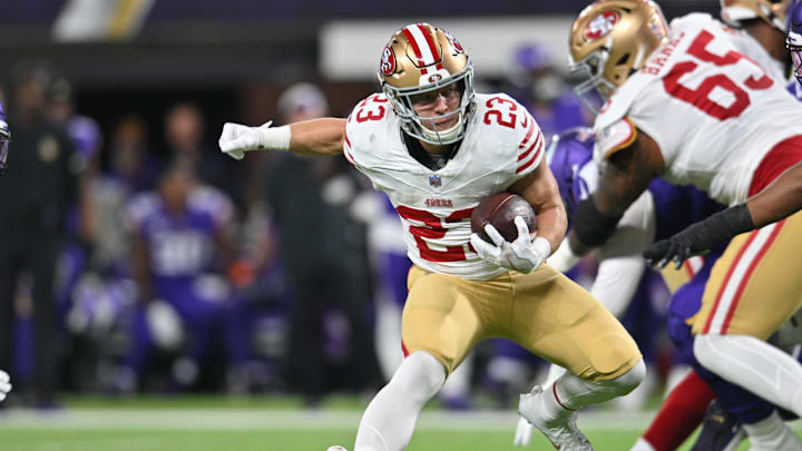 Oct 23, 2023; Minneapolis, Minnesota, USA; San Francisco 49ers running back Christian McCaffrey (23) runs the ball against the Minnesota Vikings during the first quarter at U.S. Bank Stadium. Mandatory Credit: Jeffrey Becker-Imagn Images