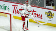 Apr 17, 2025; Ottawa, Ontario, CAN; Carolina Hurricanes goalie Frederik Andersen (31) protects the puck in the third period against the Ottawa Senators at the Canadian Tire Centre. Mandatory Credit: Marc DesRosiers-Imagn Images