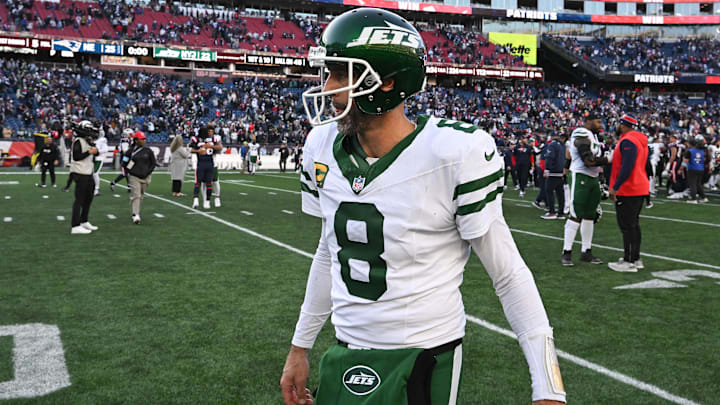Aaron Rodgers (8) walks off of the field after a game against the New England Patriots at Gillette Stadium. Aaron Rodgers (8) walks off of the field after a game against the New England Patriots at Gillette Stadium.