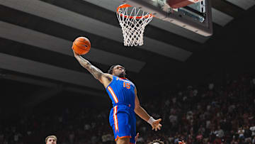 Mar 5, 2025; Tuscaloosa, Alabama, USA; Florida Gators guard Alijah Martin (15) shoots against Alabama Crimson Tide guard Mark Sears (1) during the second half at Coleman Coliseum. Mandatory Credit: Will McLelland-Imagn Images