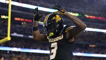 Luther Burden III crowns himself after a touchdown in his first career Bowl Game last January.