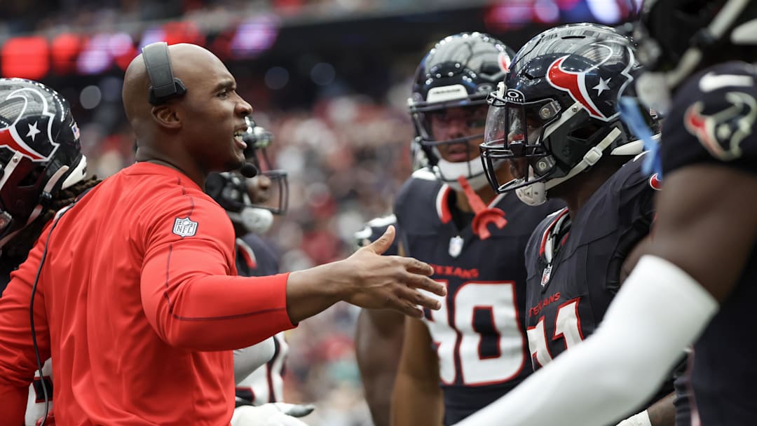 Sep 29, 2024; Houston, Texas, USA; Houston Texans head coach DeMeco Ryans celebrates defensive tackle Folorunso Fatukasi (91) defensive stop against Jacksonville Jaguars quarterback Trevor Lawrence (16) in the second half at NRG Stadium. Mandatory Credit: Thomas Shea-Imagn Images