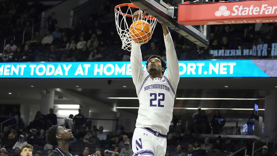 Dec 13, 2025; Evanston, Illinois, USA; Northwestern Wildcats forward Arrinten Page (22) dunks against the Jackson State Tigers during the first half at Welsh-Ryan Arena. Mandatory Credit: David Banks-Imagn Images