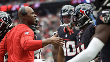 Sep 29, 2024; Houston, Texas, USA; Houston Texans head coach DeMeco Ryans celebrates defensive tackle Folorunso Fatukasi (91) defensive stop against Jacksonville Jaguars quarterback Trevor Lawrence (16) in the second half at NRG Stadium. Mandatory Credit: Thomas Shea-Imagn Images