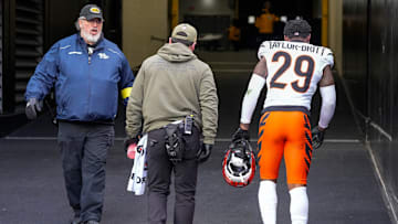 Cincinnati Bengals cornerback Cam Taylor-Britt (29) walks for the locker room with an injury in the second quarter of the NFL Week 11 game between the Pittsburgh Steelers and the Cincinnati Bengals at Acrisure Stadium in Pittsburgh on Sunday, Nov. 16, 2025. The Steelers led 10-6 at halftime.