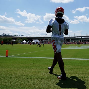 Cincinnati Bengals wide receiver Ja'Marr Chase (1) walks back for another repetition of a drill during NFL training camp practice, Monday, July 31, 2023, in Cincinnati.