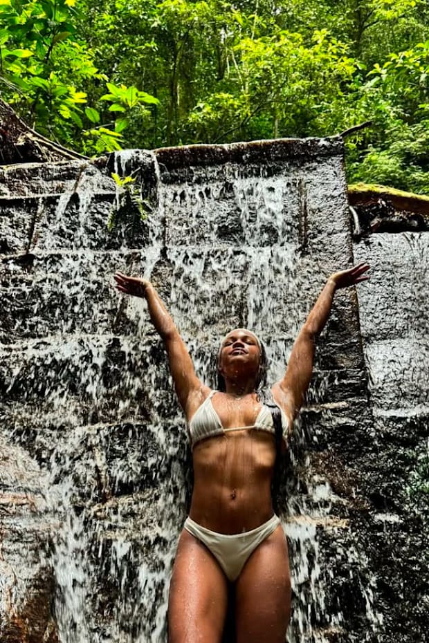 Rebeca Andrade slays Brazilian rainforest waterfall bikini stunner
