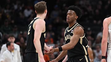 Purdue Boilermakers guard Fletcher Loyer (2) high-fives guard Myles Colvin (5) 