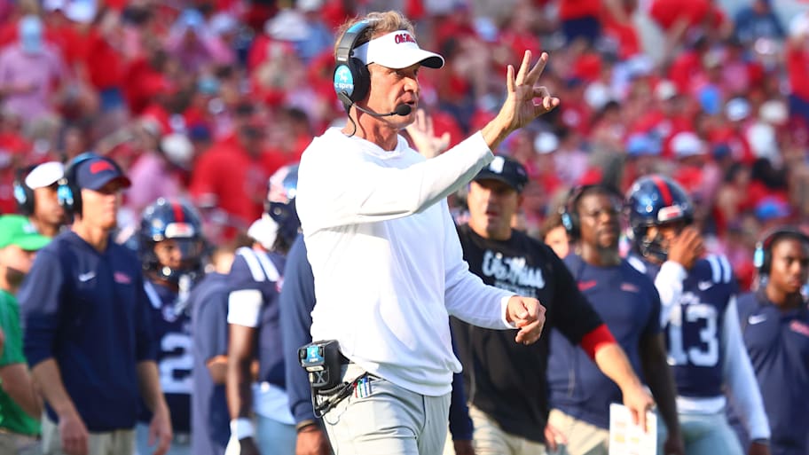 Lane Kiffin gestures on the sideline during an Ole Miss game.
