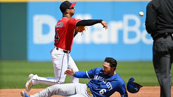 Apr 8, 2026: Cleveland Guardians shortstop Brayan Rocchio (4) forces out Kansas City Royals second baseman Jonathan India (6) and completes the double play during the third inning at Progressive Field. 