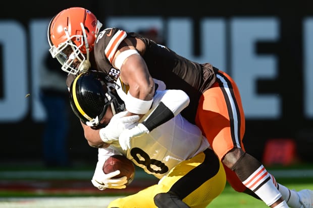 Nov 19, 2023; Cleveland, Ohio, USA; Cleveland Browns defensive end Myles Garrett (95) sacks Pittsburgh Steelers quarterback