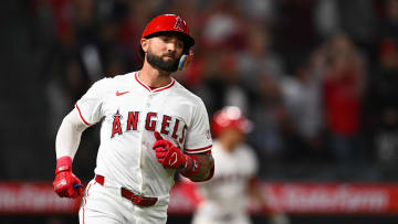 Jun 29, 2024; Anaheim, California, USA; Los Angeles Angels outfielder Kevin Pillar (12) hits a home run to defeat the Detroit Tigers during the tenth inning at Angel Stadium. Mandatory Credit: Jonathan Hui-USA TODAY Sports