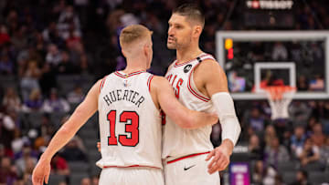 Mar 20, 2025; Sacramento, California, USA; Chicago Bulls guard Kevin Huerter (13) and center Nikola Vucevic (9) celebrate after defeating the Sacramento Kings at Golden 1 Center. Mandatory Credit: Ed Szczepanski-Imagn Images