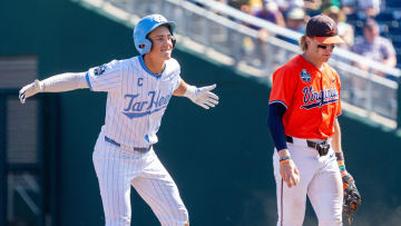 Jun 14, 2024; Omaha, NE, USA; North Carolina Tar Heels infielder Jackson Van De Brake (6) celebrates after hitting a double during the ninth inning against the Virginia Cavaliers at Charles Schwab Filed Omaha. Mandatory Credit: Dylan Widger-USA TODAY Sports