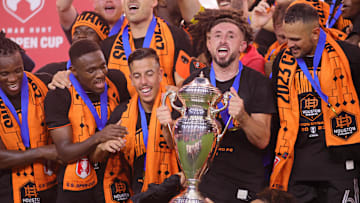 Sep 27, 2023; Fort Lauderdale, FL, USA; Houston Dynamo midfielder Hector Herrera (16) celebrates with teammates after winning the Lamar Hunt U.S. Open Cup Final against Inter Miami CF at DRV PNK Stadium. Mandatory Credit: Sam Navarro-Imagn Images