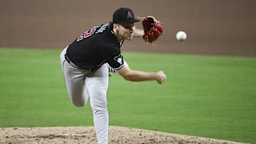Jul 9, 2025; San Diego, California, USA; Arizona Diamondbacks starting pitcher Brandon Pfaadt (32) delivers during the seventh inning against the San Diego Padres at Petco Park. Mandatory Credit: Denis Poroy-Imagn Images
