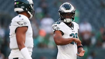 Philadelphia Eagles running back Saquon Barkley with quarterback Jalen Hurts before action against the Cincinnati Bengals