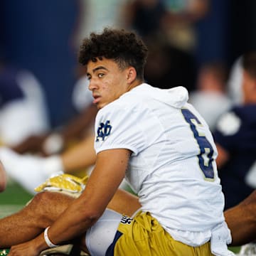 Notre Dame wide receivers Logan Saldate (19) and Jordan Faison (6) stretch before a Notre Dame football practice at Irish Athletic Center on Wednesday, July 31, 2024, in South Bend.