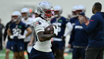 May 9, 2025; Foxborough, MA, USA; New England Patriots wide receiver Kyle Williams (18) runs with the ball during rookie camp at Gillette Stadium. Mandatory Credit: Eric Canha-Imagn Images