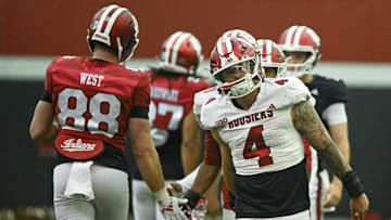 Indiana’s Sam West (88) slaps hands with linebacker Aiden Fisher (4) during spring practice on April 1, 2025.