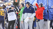 Nov 29, 2025; Morgantown, West Virginia, USA; West Virginia Mountaineers head coach Rich Rodriguez walks along the sidelines during the first quarter against the Texas Tech Red Raiders at Milan Puskar Stadium.