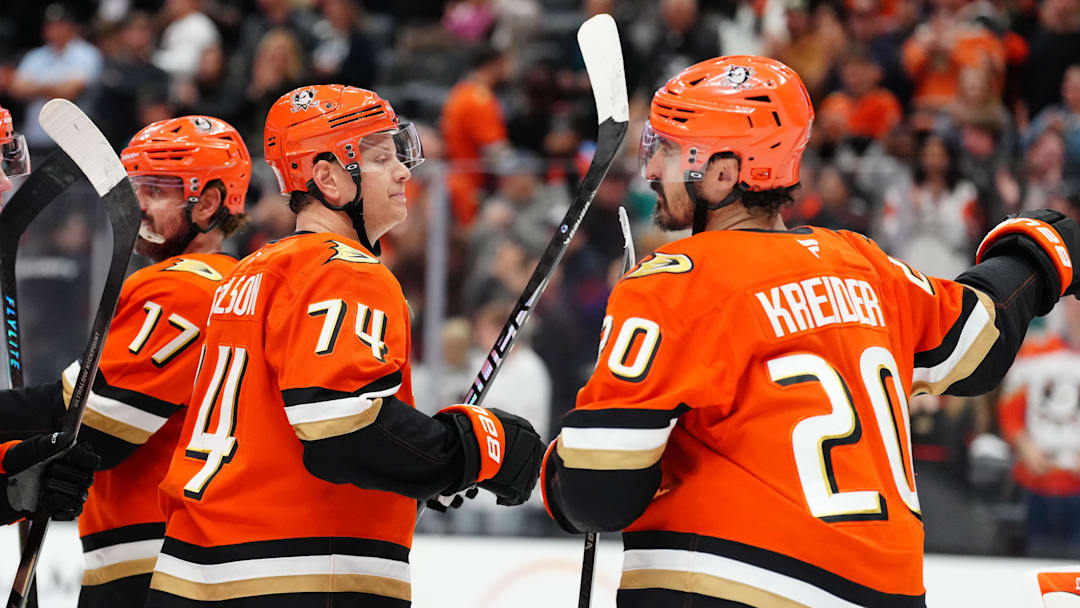 Apr 9, 2026; Anaheim, California, USA; Anaheim Ducks defenseman John Carlson (74) and left wing Chris Kreider (20) celebrate after the game against the San Jose Sharks at the Honda Center. Mandatory Credit: Kirby Lee-Imagn Images